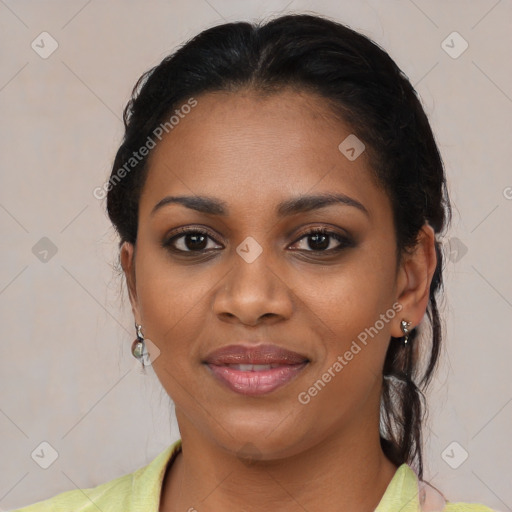 Joyful latino young-adult female with medium  brown hair and brown eyes