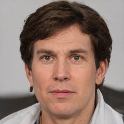 Neutral white adult male with short  brown hair and brown eyes