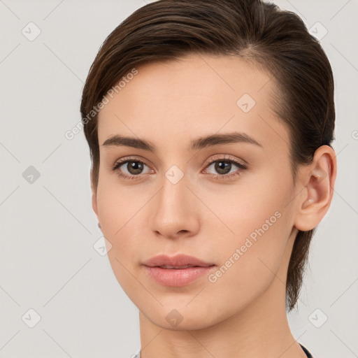 Neutral white young-adult female with medium  brown hair and brown eyes