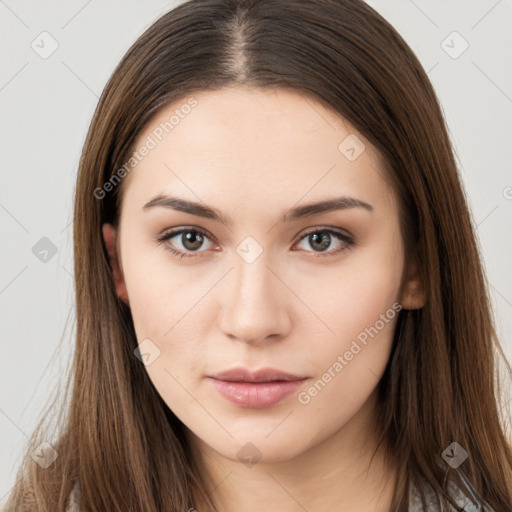 Neutral white young-adult female with long  brown hair and brown eyes