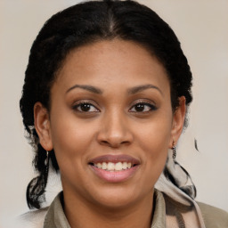 Joyful latino young-adult female with medium  brown hair and brown eyes