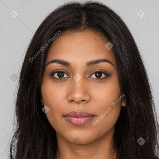 Joyful latino young-adult female with long  brown hair and brown eyes