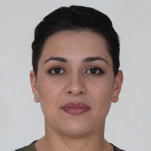 Neutral white young-adult female with short  brown hair and brown eyes