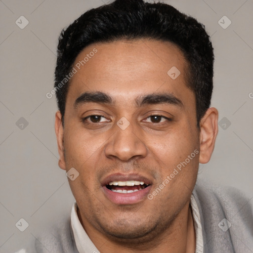 Joyful white young-adult male with short  black hair and brown eyes