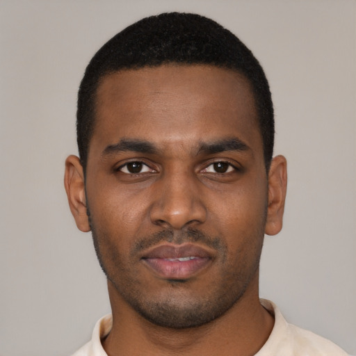 Neutral black young-adult male with short  black hair and brown eyes