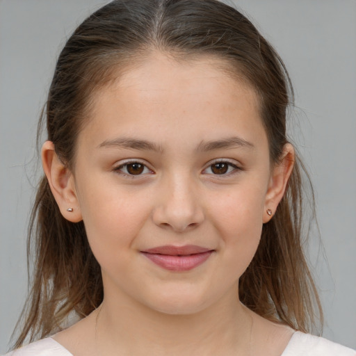 Joyful white child female with medium  brown hair and brown eyes