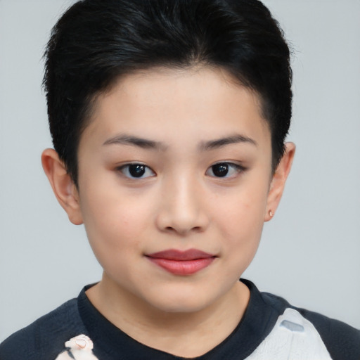 Joyful asian child female with short  brown hair and brown eyes