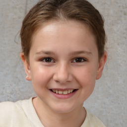 Joyful white child female with short  brown hair and brown eyes