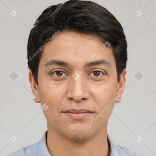 Joyful white young-adult male with short  black hair and brown eyes