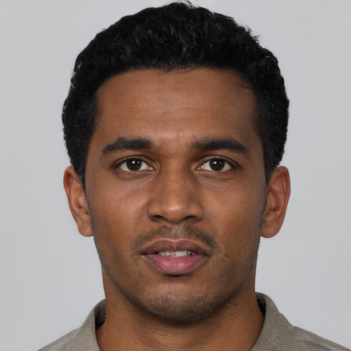 Neutral black young-adult male with short  black hair and brown eyes