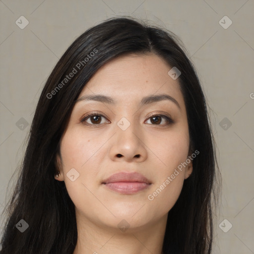 Joyful asian young-adult female with long  black hair and brown eyes