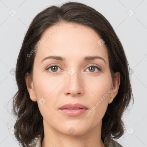 Neutral white young-adult female with medium  brown hair and brown eyes