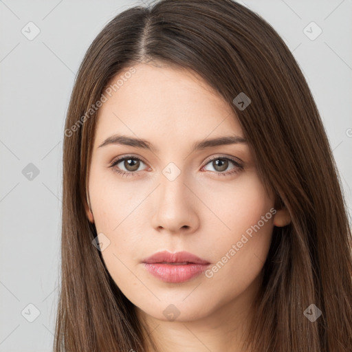 Neutral white young-adult female with long  brown hair and brown eyes