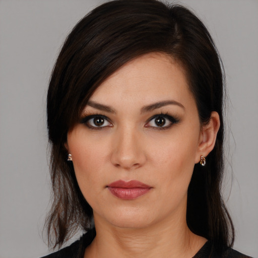 Neutral white young-adult female with medium  brown hair and brown eyes