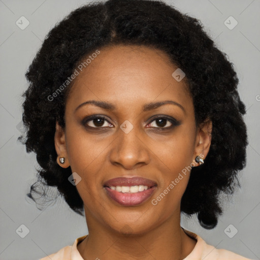 Joyful black young-adult female with long  black hair and brown eyes