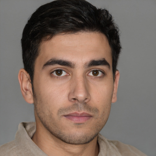 Neutral white young-adult male with short  brown hair and brown eyes