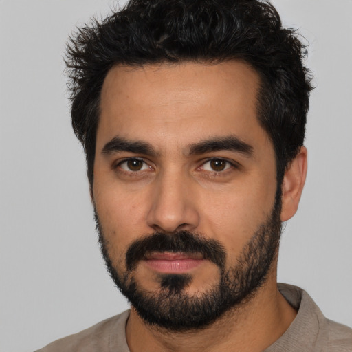 Neutral latino young-adult male with short  black hair and brown eyes
