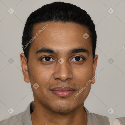 Joyful latino young-adult male with short  black hair and brown eyes