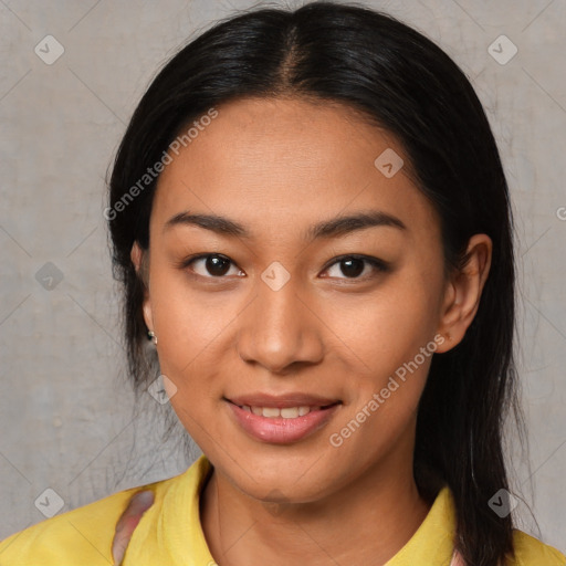 Joyful latino young-adult female with medium  black hair and brown eyes