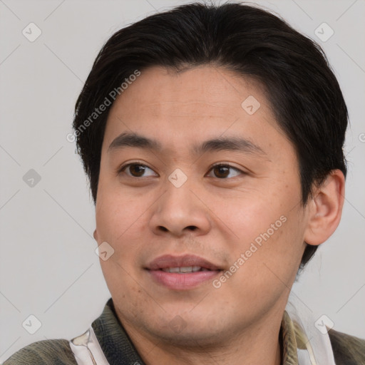 Joyful asian young-adult male with short  brown hair and brown eyes