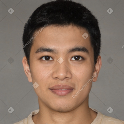 Joyful latino young-adult male with short  brown hair and brown eyes