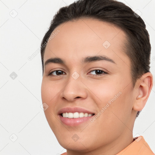 Joyful white young-adult female with short  brown hair and brown eyes