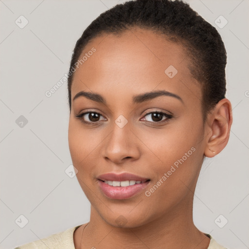 Joyful latino young-adult female with short  brown hair and brown eyes