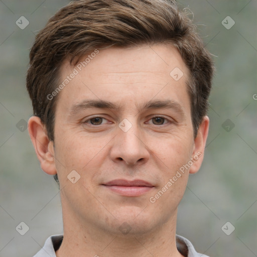 Joyful white adult male with short  brown hair and grey eyes