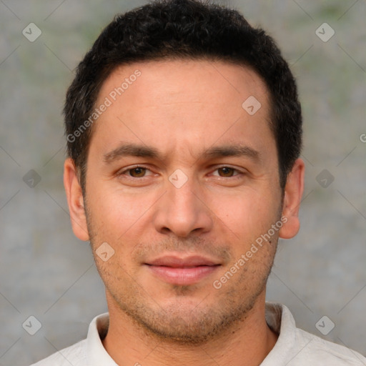 Joyful white young-adult male with short  brown hair and brown eyes