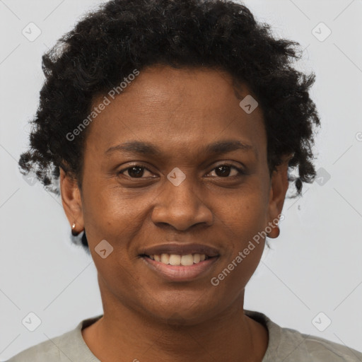 Joyful black young-adult male with short  brown hair and brown eyes