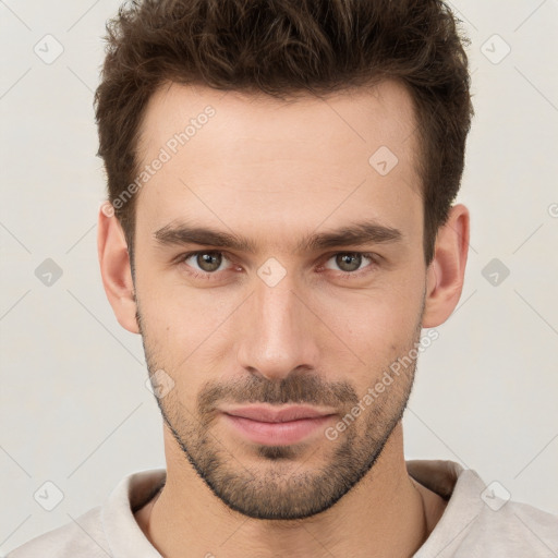 Neutral white young-adult male with short  brown hair and brown eyes