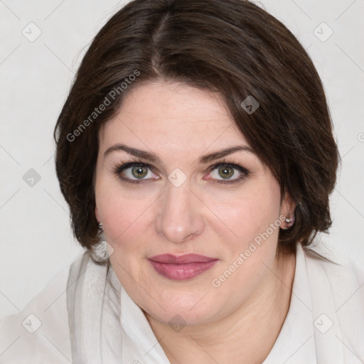 Joyful white young-adult female with medium  brown hair and green eyes