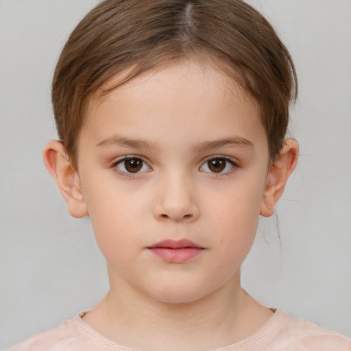 Neutral white child female with short  brown hair and brown eyes