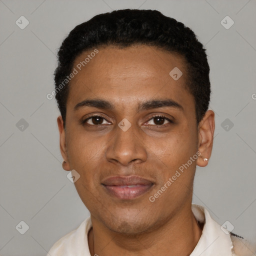 Joyful black young-adult male with short  black hair and brown eyes