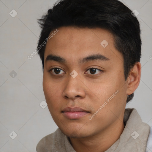 Neutral asian young-adult male with short  black hair and brown eyes