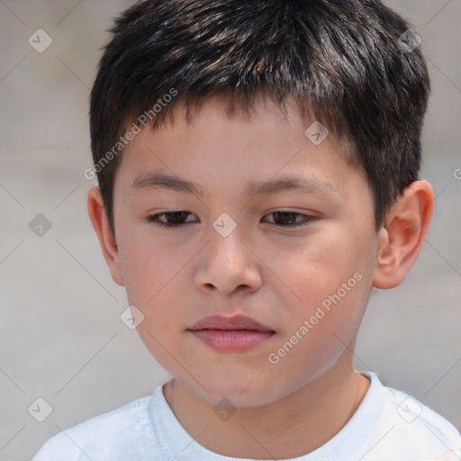 Joyful white child male with short  brown hair and brown eyes