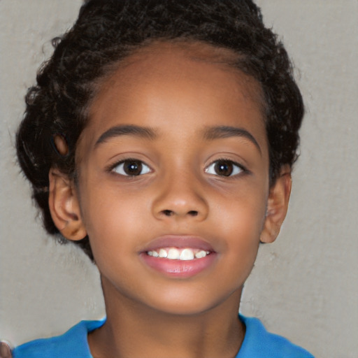 Joyful latino child female with short  brown hair and brown eyes