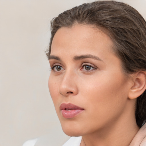 Neutral white young-adult female with short  brown hair and brown eyes