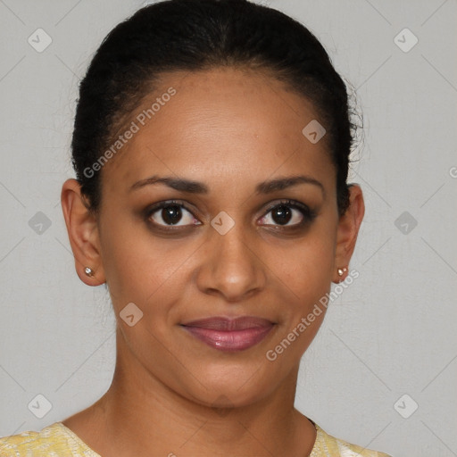 Joyful black young-adult female with short  brown hair and brown eyes