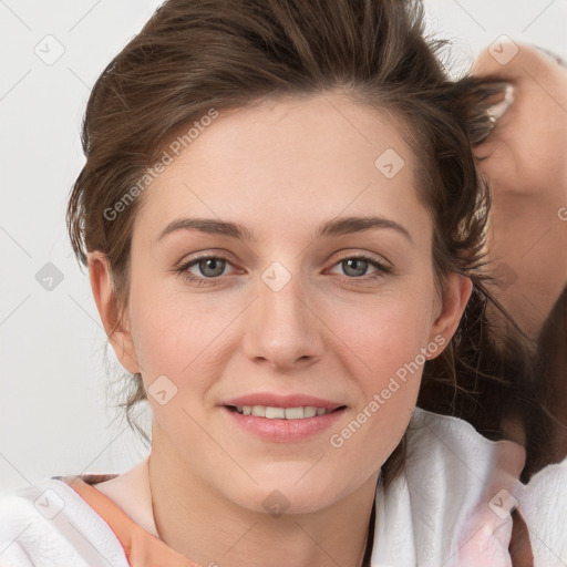 Joyful white young-adult female with medium  brown hair and grey eyes