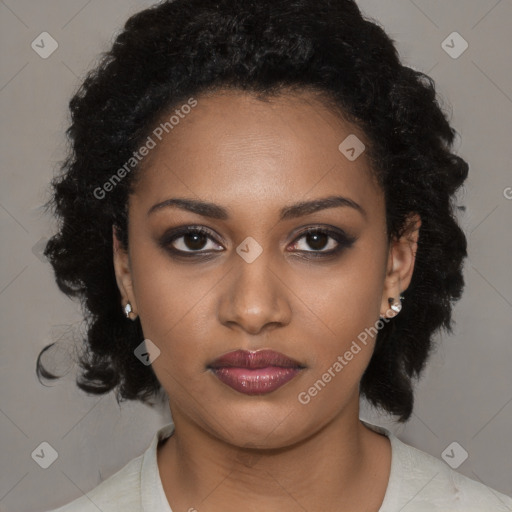 Joyful black young-adult female with medium  black hair and brown eyes