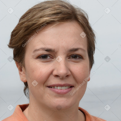 Joyful white young-adult female with short  brown hair and grey eyes