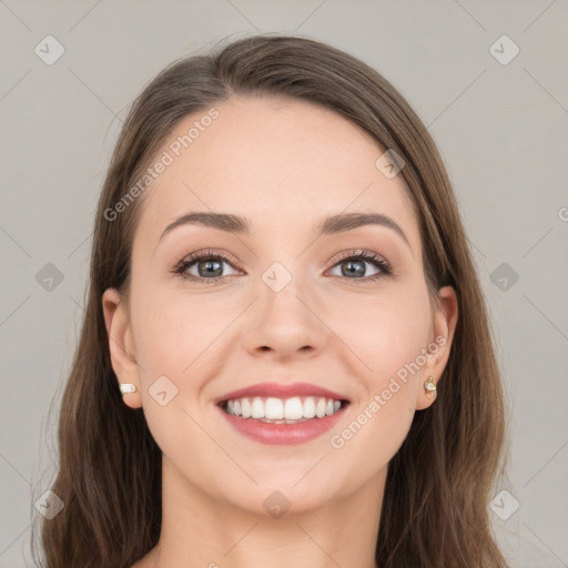 Joyful white young-adult female with long  brown hair and grey eyes