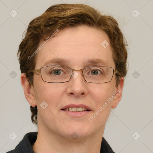 Joyful white adult male with short  brown hair and grey eyes