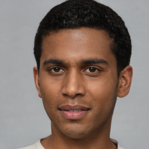 Neutral black young-adult male with short  brown hair and brown eyes