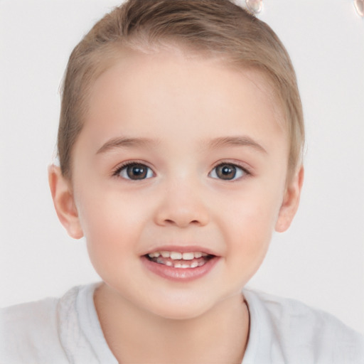 Joyful white child female with short  brown hair and brown eyes