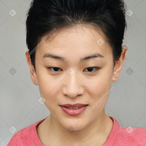 Joyful asian young-adult female with short  brown hair and brown eyes