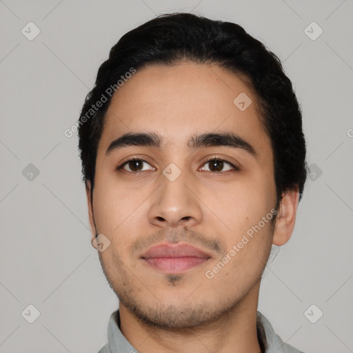 Neutral latino young-adult male with short  black hair and brown eyes