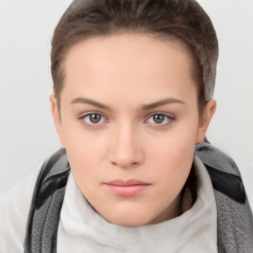 Neutral white young-adult female with short  brown hair and brown eyes