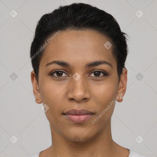 Joyful latino young-adult female with short  black hair and brown eyes